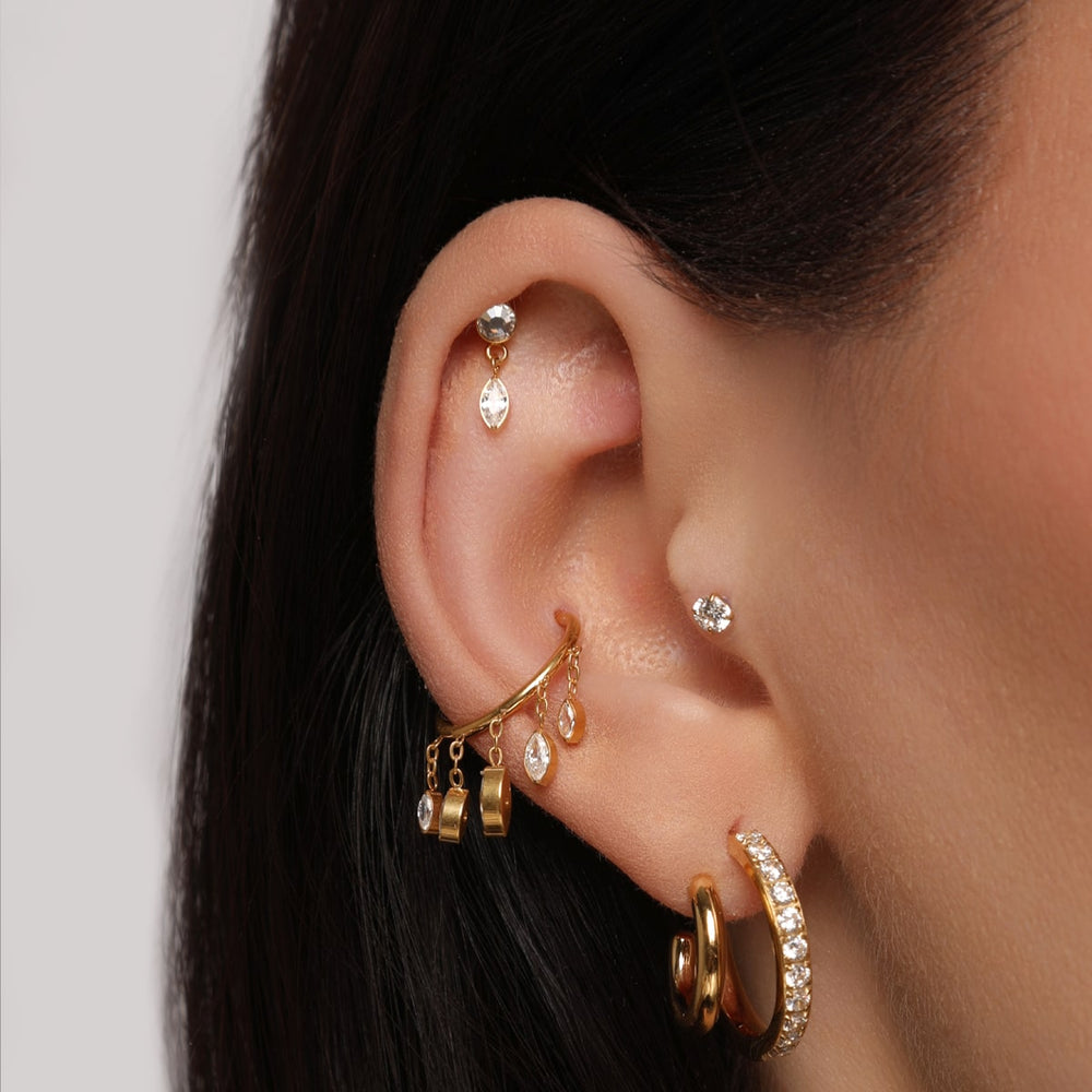 Helix Labret Piercing mit Anhänger