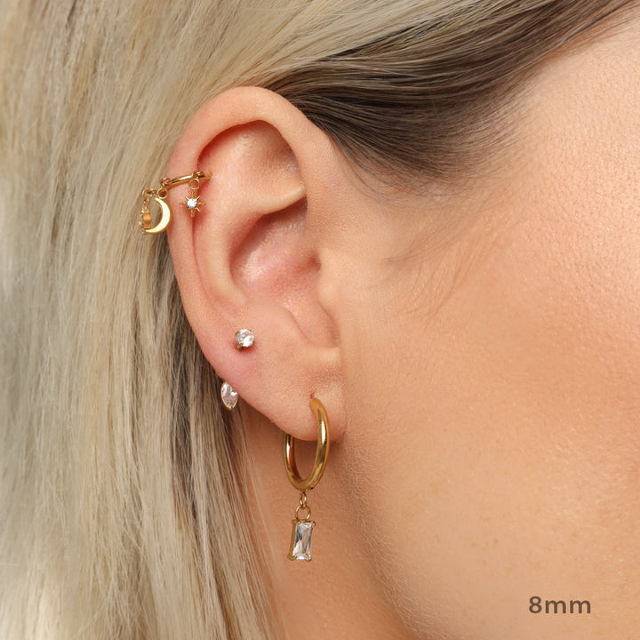 Night Conch Piercing | Titan